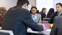 Hampton University’s International Students, Scholars and Programs Assistant Director Samaria Haysbert, center, smiles with her group mates during the Department of Energy (DOE) Boost Program meeting held in Newport News, Va., on Thursday, April 25, 2024.